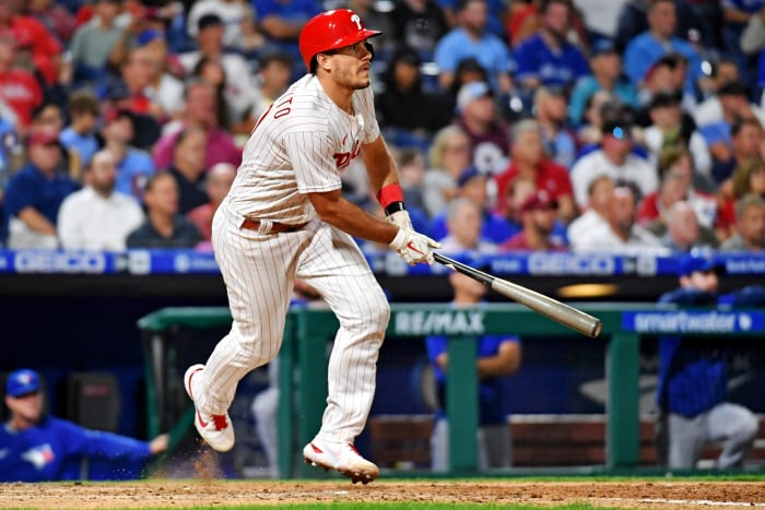 Sep 20, 2022; Philadelphia, Pennsylvania, USA; Philadelphia Phillies catcher J.T. Realmuto (10) hits an RBI single against the Toronto Blue Jays during the fifth inning at Citizens Bank Park.